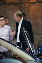 Jaguar's Giles Taylor talking to reporter in NYC