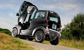 The single door on Gordon Murray's T25 city car pivots forward. (Photo from AutoWeek.)