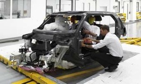 BMW will cut the weight of the MegaCity Vehicle by making its structure from carbon fiber. Here a prototype undergoes airbag testing. (Photo courtesy of AutoWeek.)