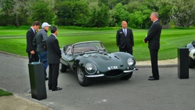Jaguar execs gather around an XKSS. (Photo by Josh Condon.)