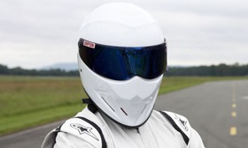 The masked racer known as the Stig, from BBC's Top Gear. (Photo by Todd Antony/BBC, from Guardian UK.)