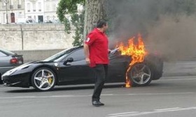 This photo of a Ferrari 458 Italia owner walking away from his burning car in Paris has been posted on several Internet sites. (Photo courtesy of AutoWeek.)