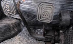 The pedal set on a classic Volkswagen Beetle was hinged on the car's floorboard. Floor-hinged pedals are in tune with the natural motion of your foot. (Photo from AutoWeek.)