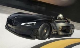 The Peugeot EX1 is propelled by two electric motors. (Photo courtesy of AutoWeek.)