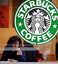Credit: (© Michael Conroy/AP)
Caption: Customer in a Starbucks store