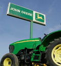 John Deere equipment stands ready for sale at Deems Farm Equipment Inc., in Lawrence, KA (© Orlin Wagner/AP)