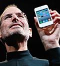 Credit: (© Paul Sakuma/AP)
Caption: Apple CEO Steve Jobs holds the new iPhone 4