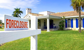 Only 43% of survey respondents indicated they would be somewhat willing to buy a foreclosure, compared with 55% six months earlier. (&copy; Tetra Images/Superstock)