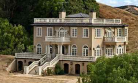 This 6,200-square-foot home in Lafayette, Calif., which includes a vineyard on its 14-acre lot, was recently slashed from $4 million to $3.2 million. (© Realtor.com)