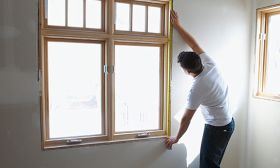Energy-efficient windows are among the more popular projects that are more likely to increase your home's value. (© Wilkosz & Way/Corbis)