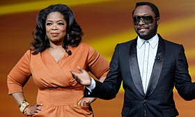Rapper and producer will.i.am paid off delinquent home mortgages for two guests on 'The Oprah Winfrey Show.' (© Mary Altaffer/AP)