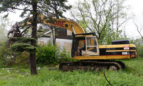 Detroit plans to demolish 6,000 abandoned homes in the next two years. (© Carlos Osorio/AP)